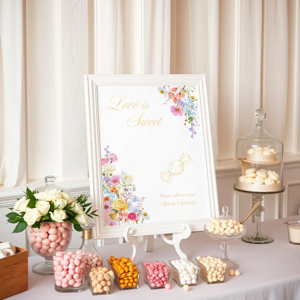 Love is Sweet Wedding Table Sign - Our Summer Collection features beautiful wedding stationery and signage with gentle summer colours, vibrant florals, and soft butter yellow text – perfect for adding a fresh, romantic feel to your special day.