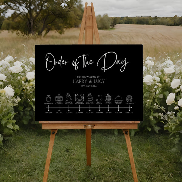 Black order of the day sign customised. A timeless and chic black wedding board, featuring crisp and sophisticated white text.