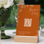 Toasted Amber photo sharing QR code wedding sign with burnt orange background and white botanical line art