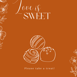 Toasted Amber sweet table wedding sign with burnt orange background and white botanical line art