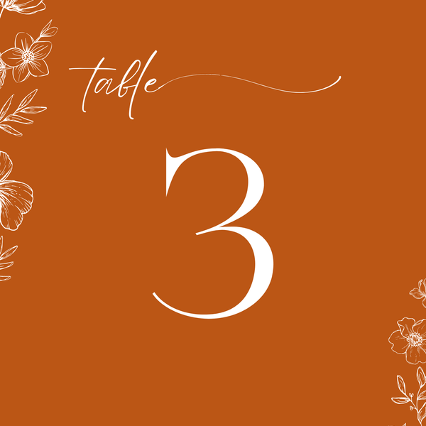 Toasted Amber wedding table number card with burnt orange background and white botanical line art