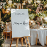 minimalist wedding welcome sign - personalised wedding welcome board, with off-white background and crisp black text