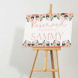 pink and peach floral reserved in memory wedding chair sign - affordable wedding signs