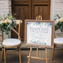 blue floral reserved in memory wedding chair sign - affordable wedding signs