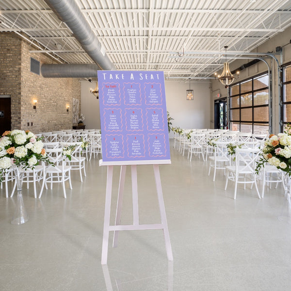 Playful Take A Seat Wedding Sign