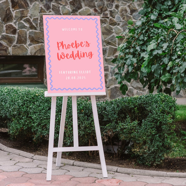 pink and red abstract bride's wedding featuring groom sign - funny wedding welcome sign