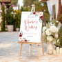 red and cream floral bride's wedding featuring groom sign - funny wedding welcome sign