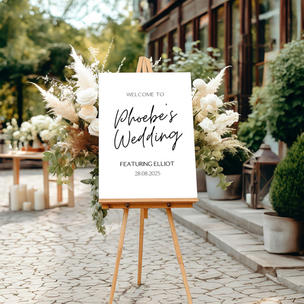 sophisticated bride's wedding featuring groom sign - funny wedding welcome sign