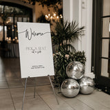 timeless white pick a seat not a side wedding welcome sign - personalised minimalist white wedding ceremony sign, featuring a crisp white background, with elegant black typography, giving the ultimate classy-chic look.